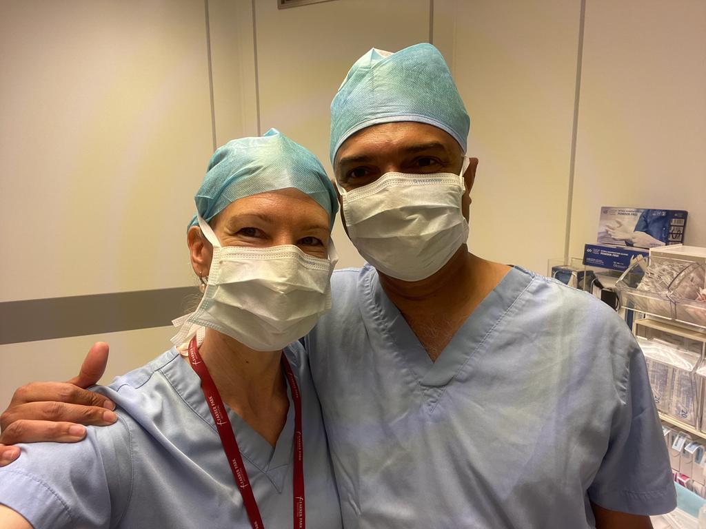 Rebecca and Vyas in operating theatre